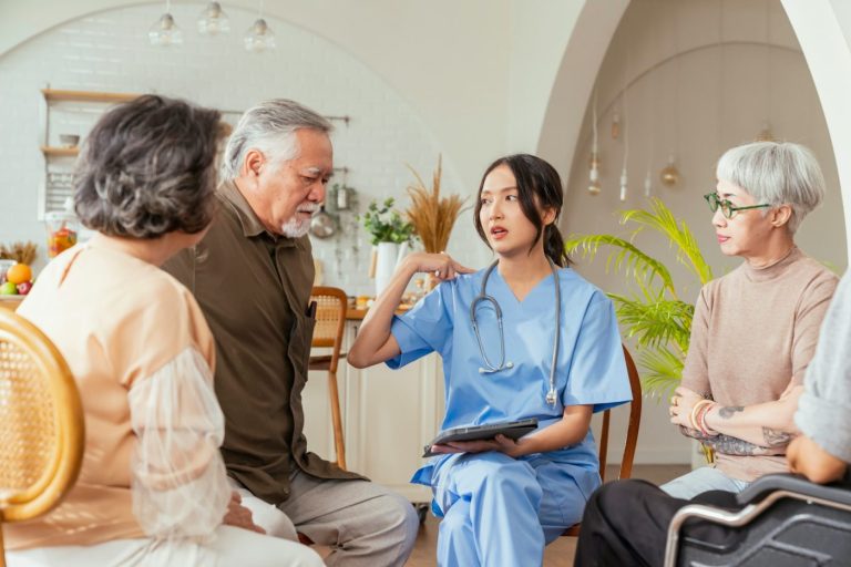 A group of caregivers working with a Veteran