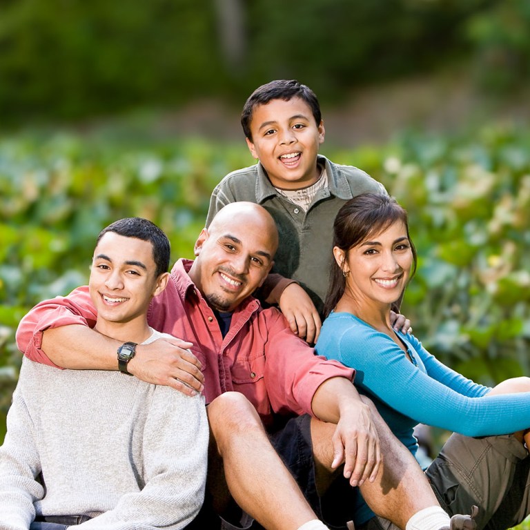 A Veteran family - two children, a father and a mother.