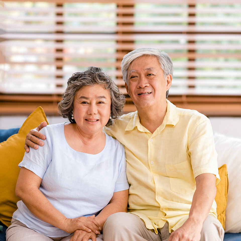 An older Asian couple.